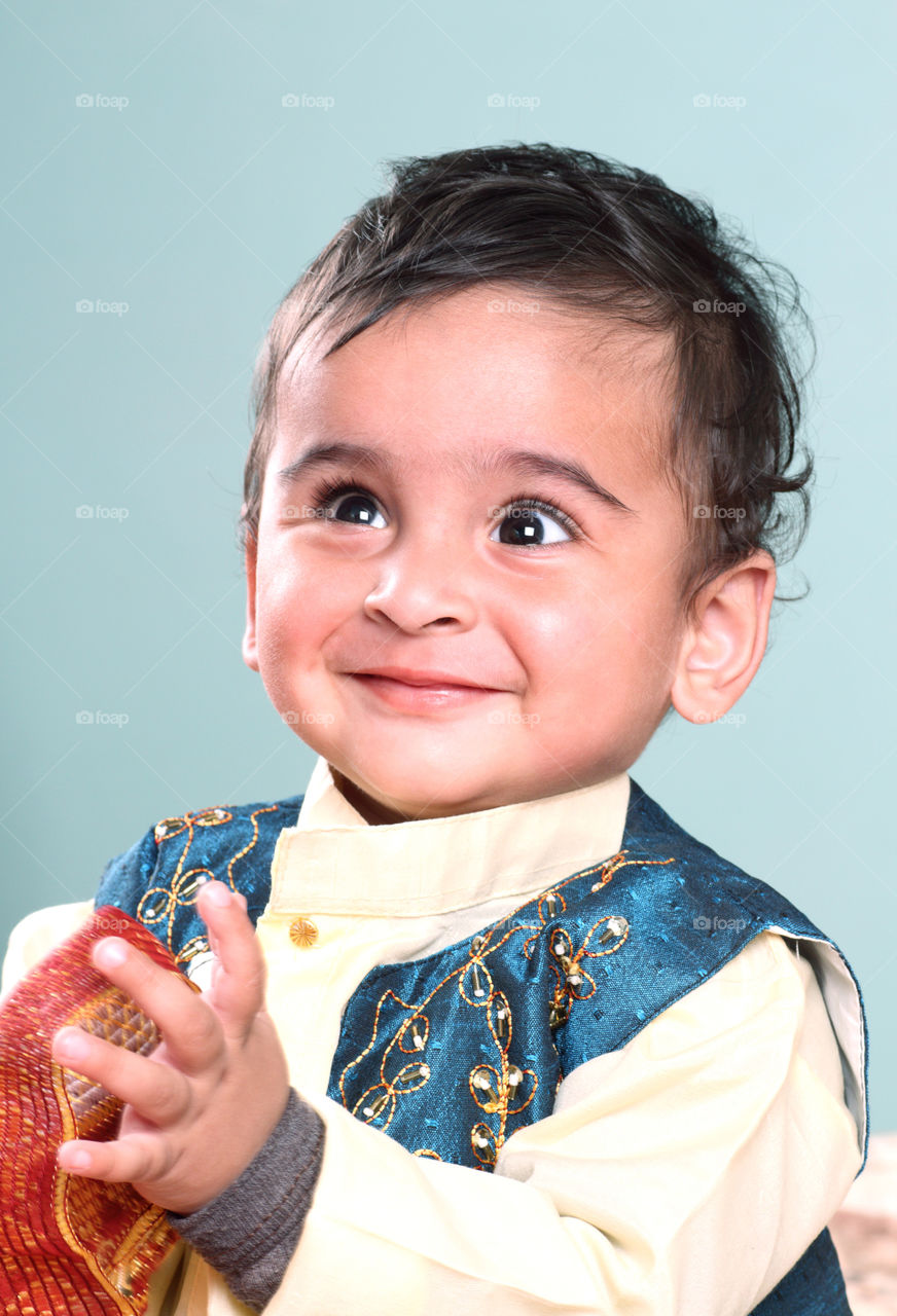 Cute happy Indian baby boy