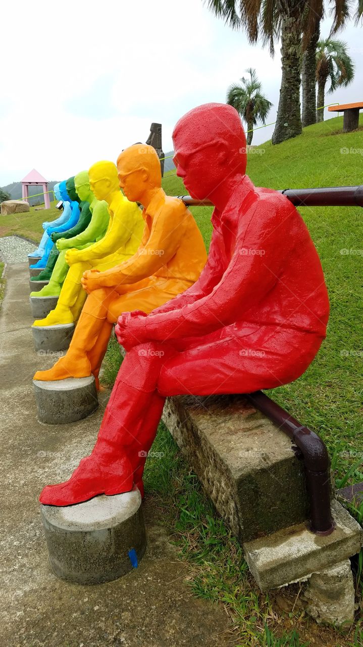 Colorful statutes of man