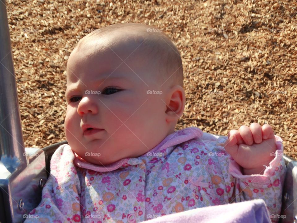 Baby In A Swing
