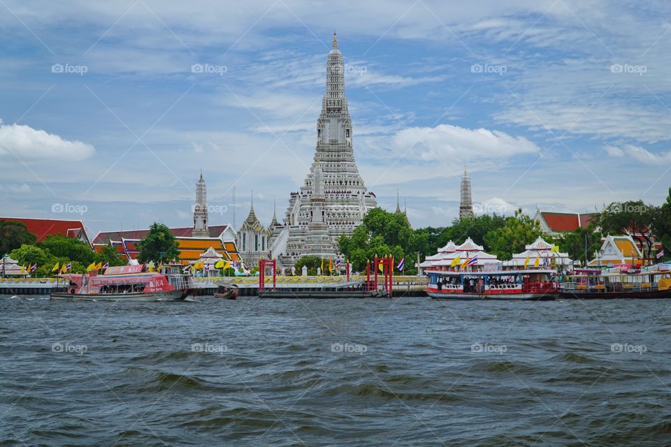 wat arun temple as seen from chao phraya river