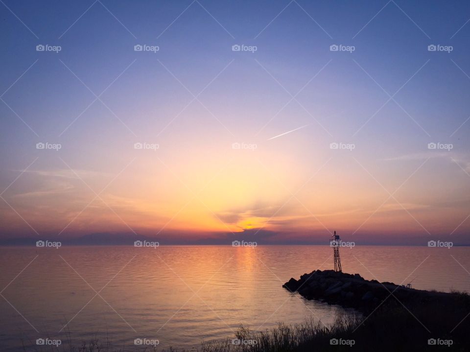 Stone pier at sea