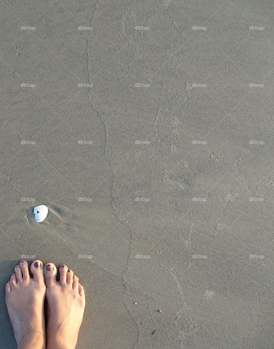 soaking sun light on the beach in summer