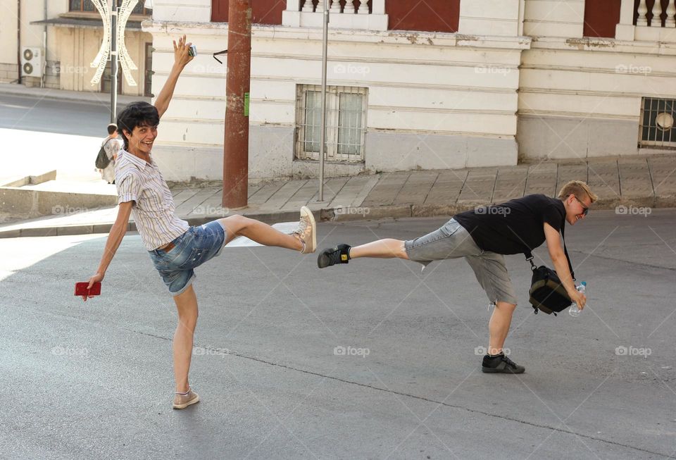 Young women having fun at the street