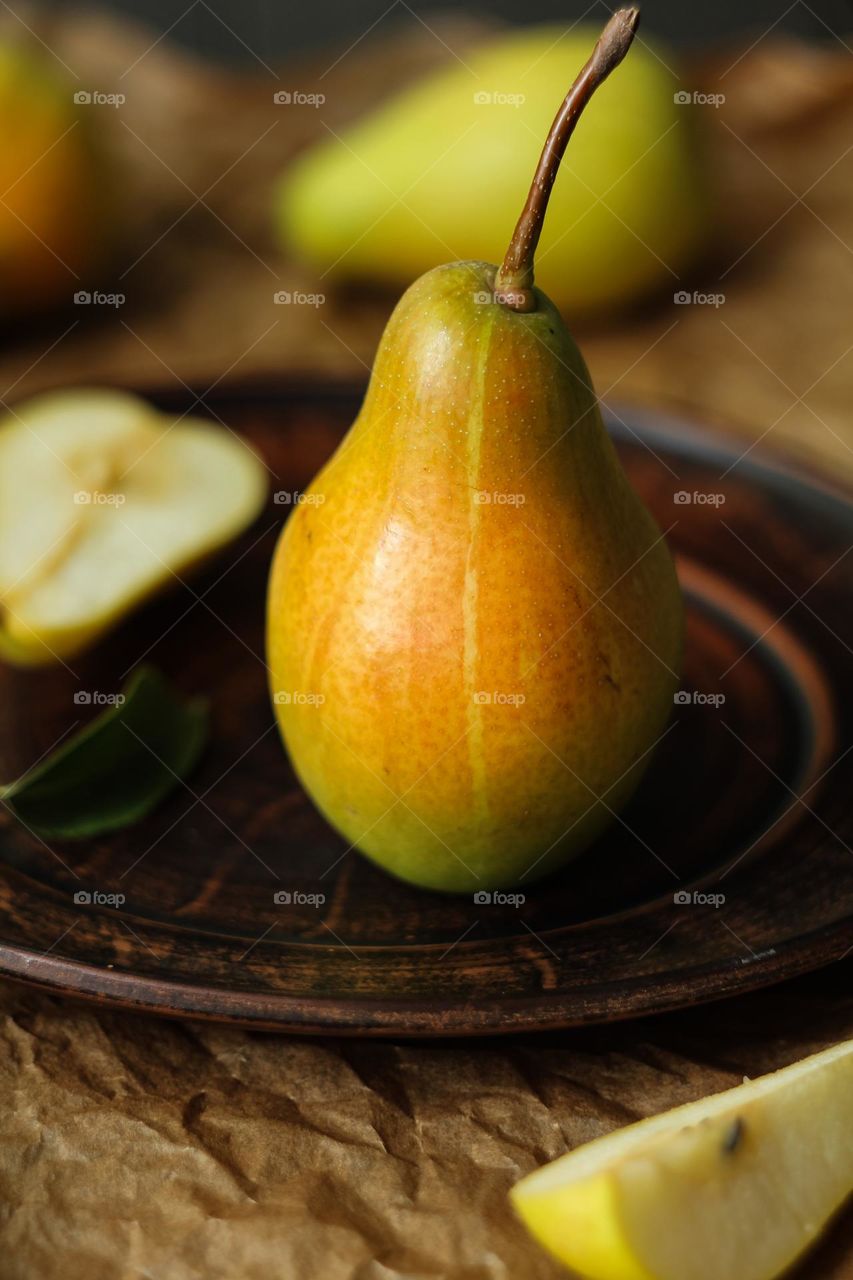 A pear on a plate