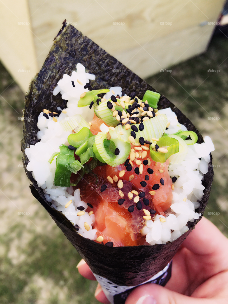 Salmon handroll sushi from food truck