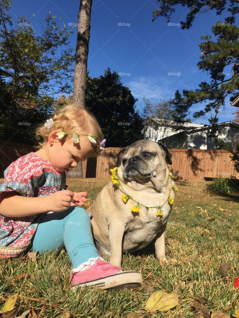 Making flower necklaces takes concentration