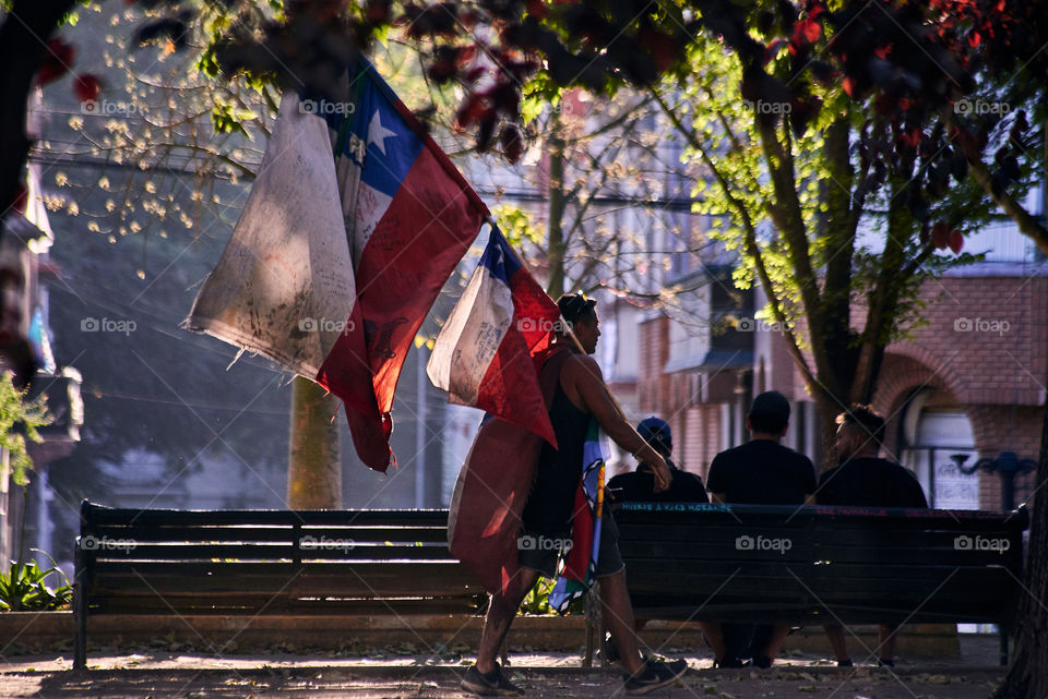 man walked with flags in the air