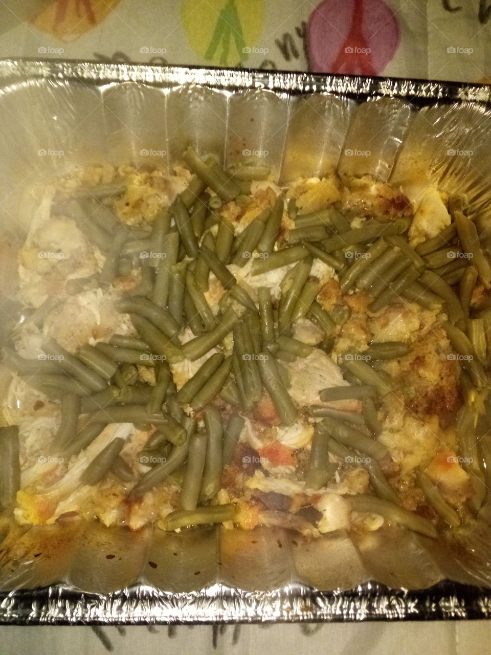 leftover deboned chicken thighs and cornbread stuffing with string beans I added to stretch my meal