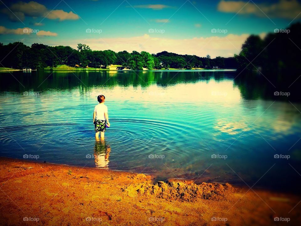 Boy on the lake