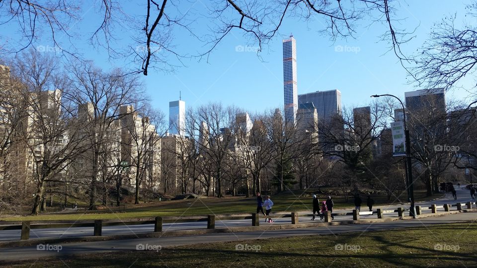 Just a jog. In Central park looking at part of the skyline, runners passing by