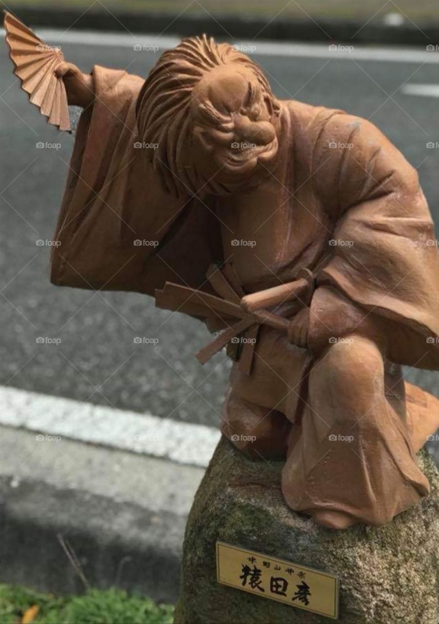 The Statue by the Road