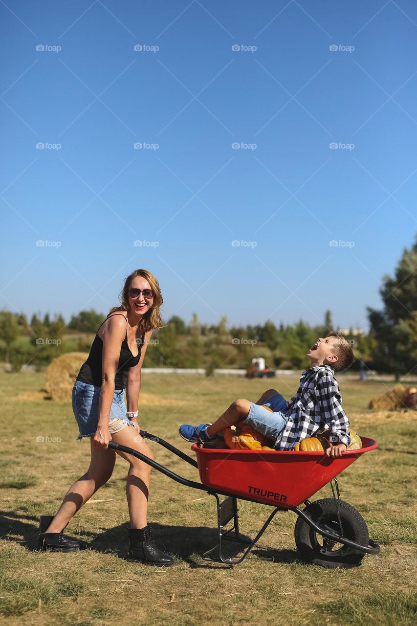 Autumn mood, mom and son, happy together 