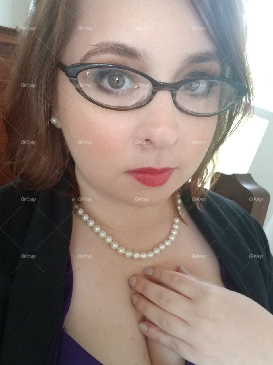 girl makeup woman pearls selfie serious lipstick glasses
