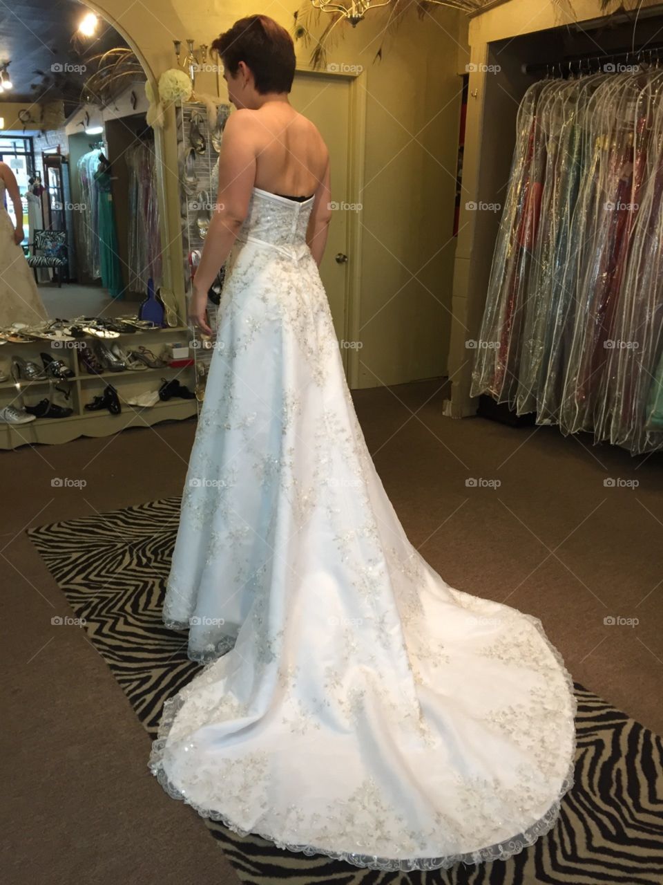 Trying on dresses. Trying on wedding dresses