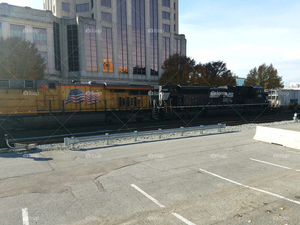 Diesel engines rolling through downtown Roanoke past the Wachovia Tower