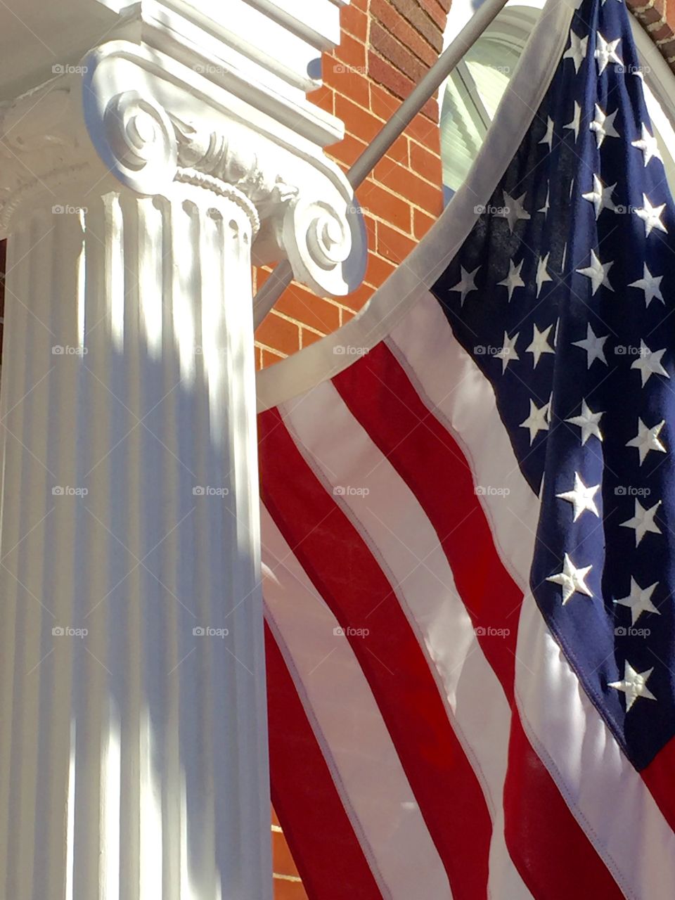 American flag and column 