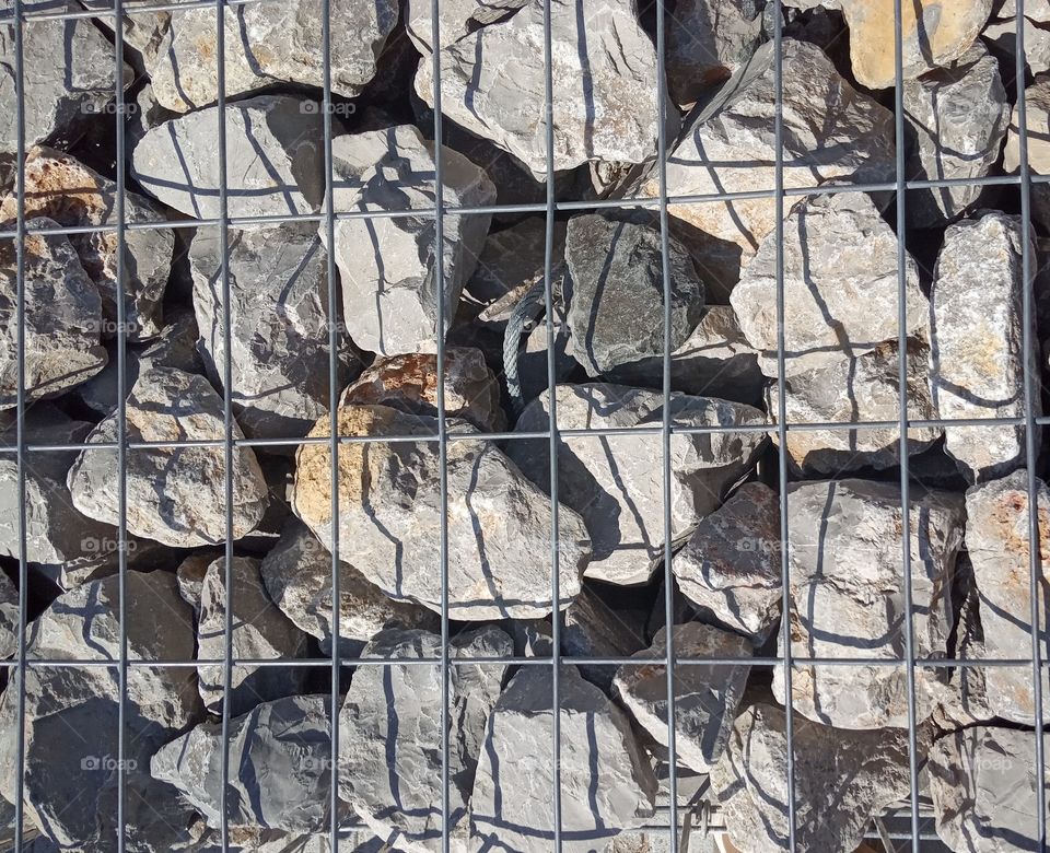 Stones and wire squares