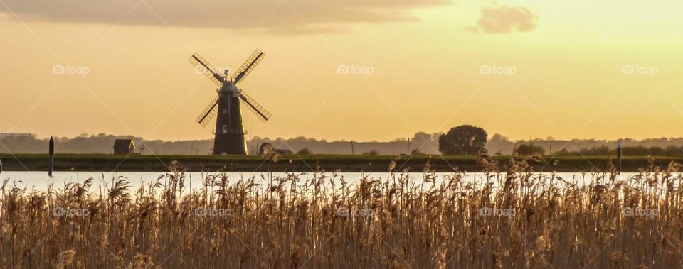 Windmill by the water
