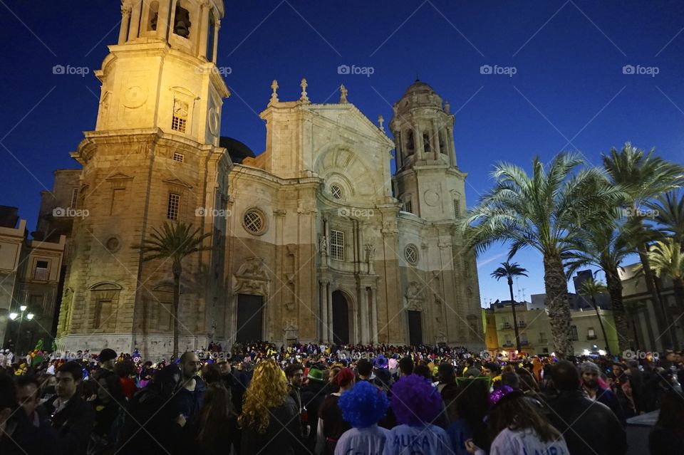 Celebrating Carnival at the steps of the Cádiz Cathedral, Spain 