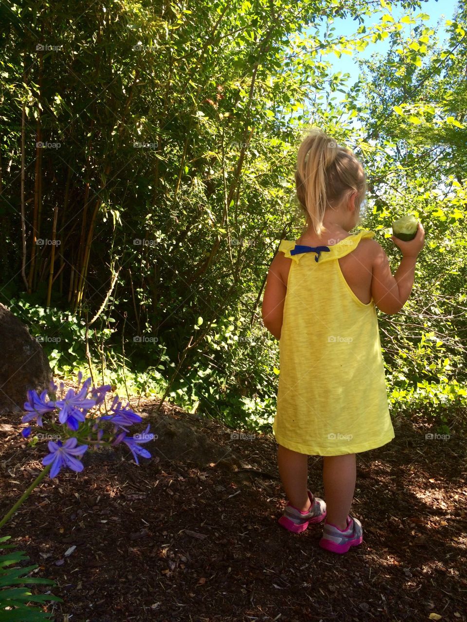 Little girl in the garden