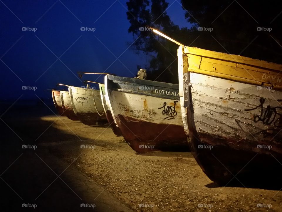 Old wooden boats on the coast