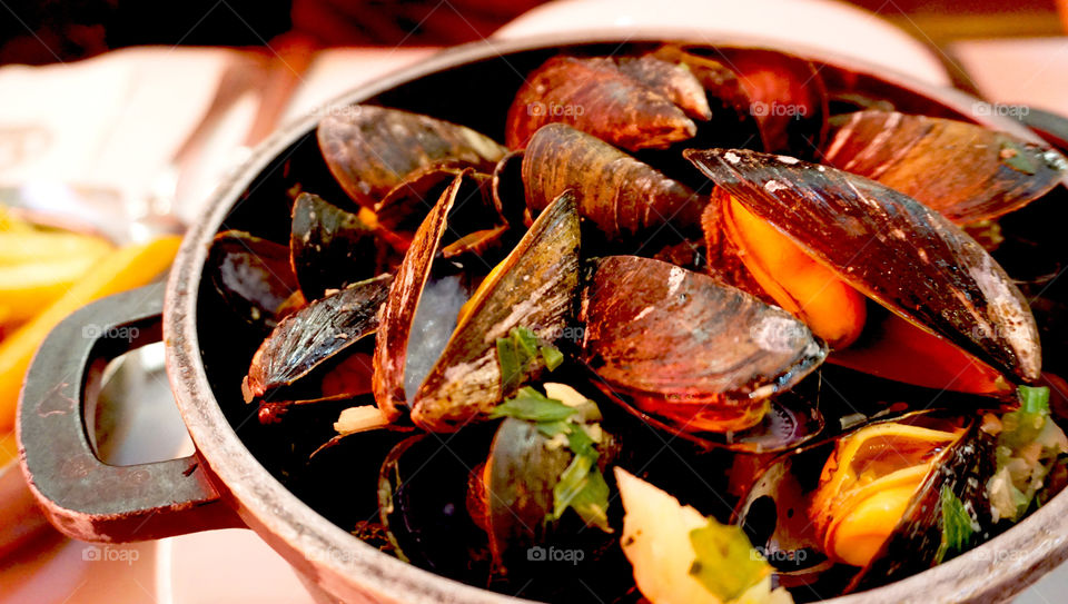 Baked mussels with white wine in belgium