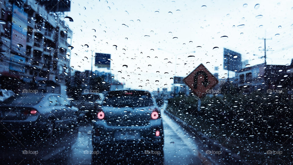 Traffic jam when it rains.View through the windshield.