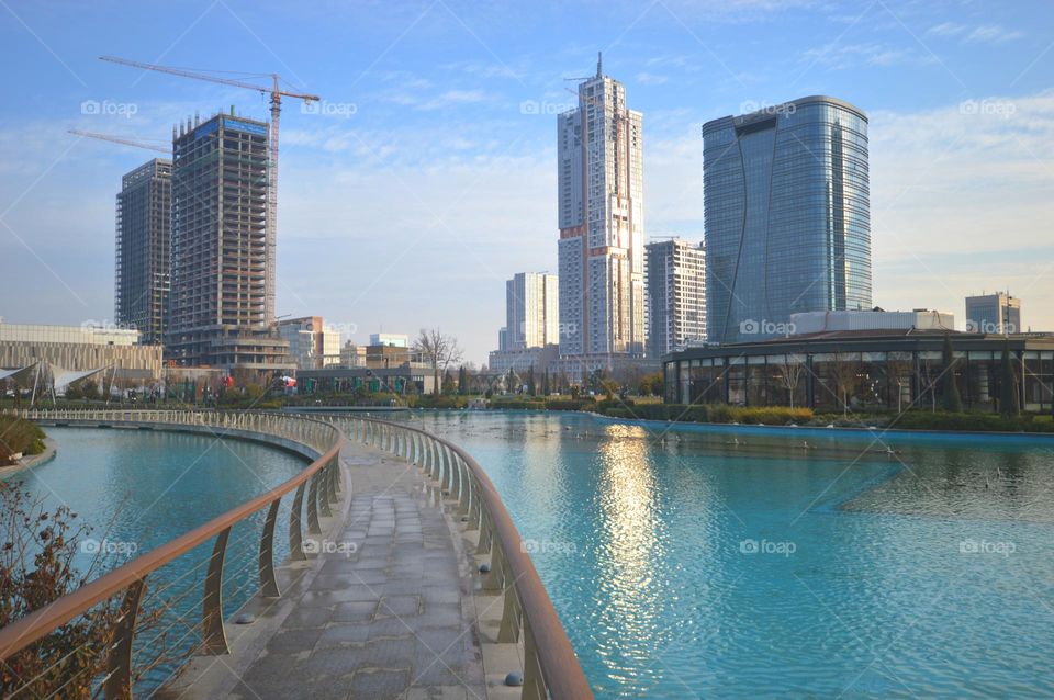 sea pier city skyscrapers  coast, sky