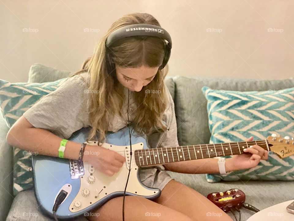 Girl playing guitar