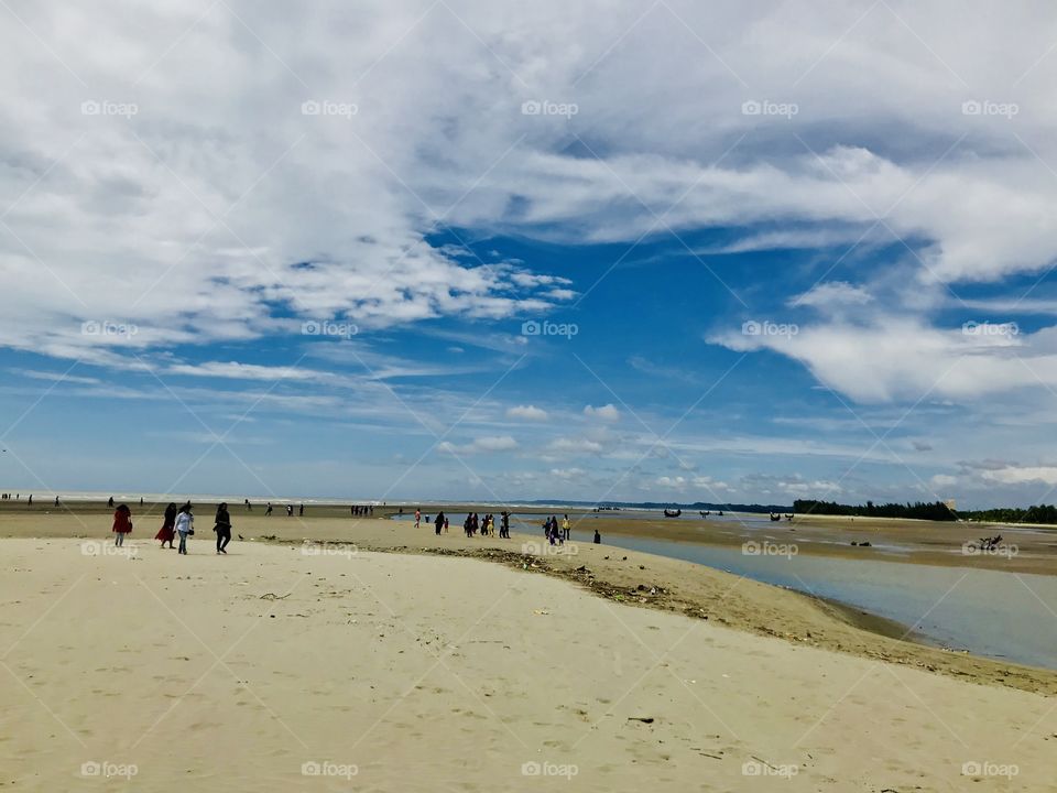World largest sea beach the Cox’s Bazar beauty of nature........... sky...... water ........ clouds...... land.....