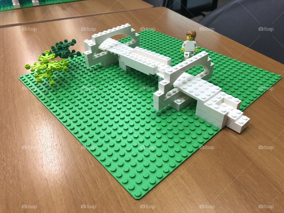 Lego of a bridge in modern architecture in white and green