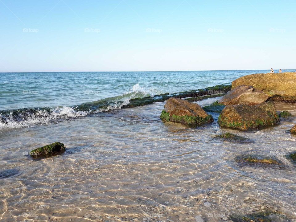 Sand beach with rocks