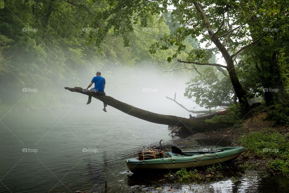 Foap, Best of the Best: A kayaker sits upon a protruding log and admires the peaceful scenery of the fog resting upon the water. Elk River, Franklin County, Tennessee. 