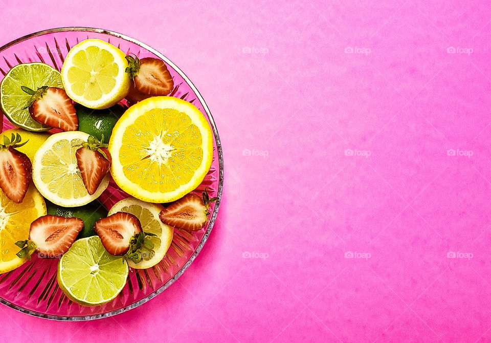 cut citrus fruits in a bowl.