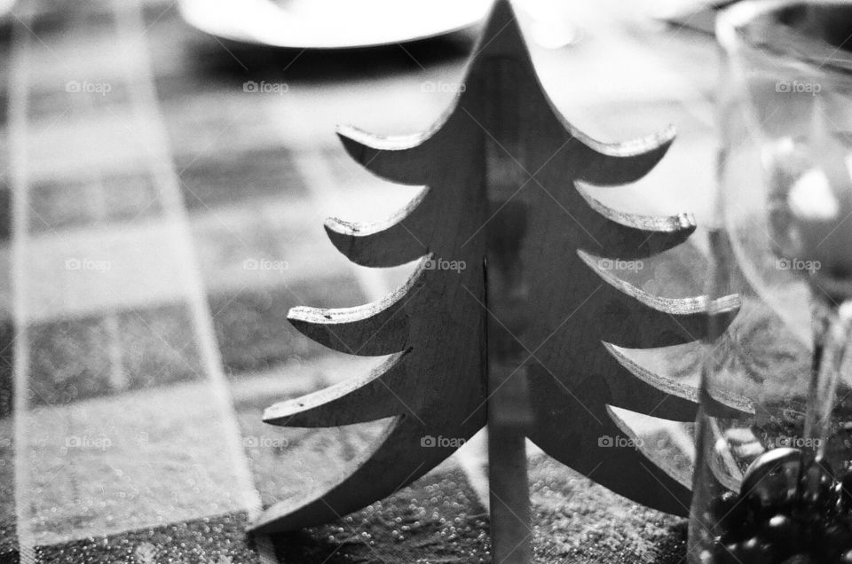 Homemade diy wooden Christmas tree decoration on kitchen table