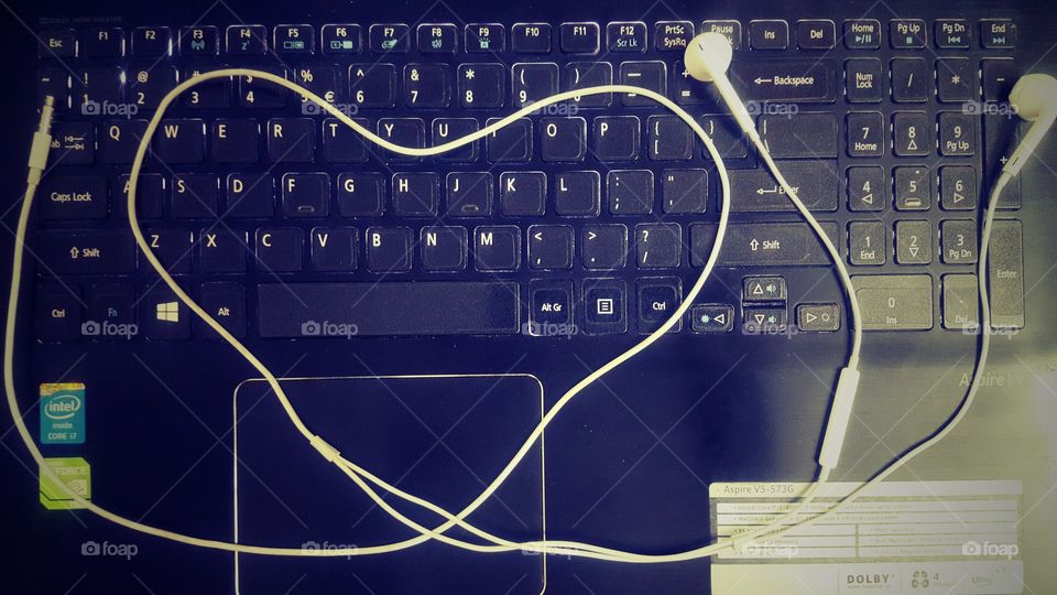 earphone love 😍 apple iphone's earphone
I love you
on laptop keyboard.
 😗 beautiful with edit a little 🤔