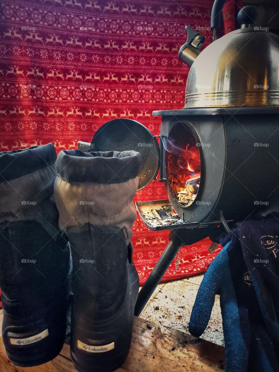 Drying boots by the fire.