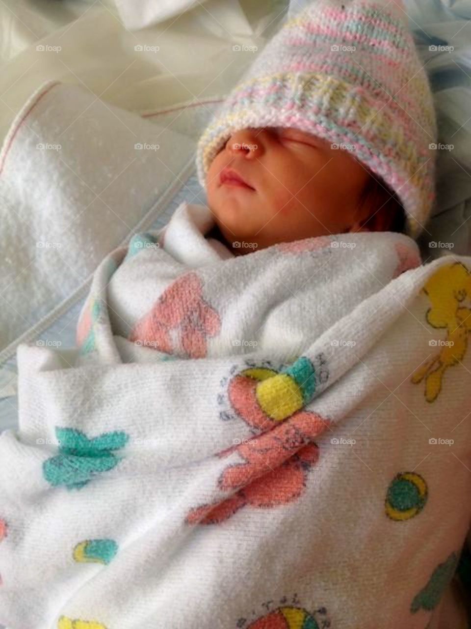 A Life Begins. Newly Born is the first day, the beginning of a life cycle.  Infant-Child-Adult-Parent-Grandparent.