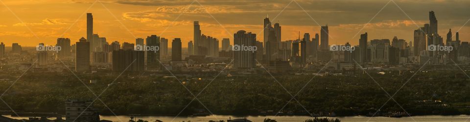 Golden twilight over skyscraper in Bangkok Thailand