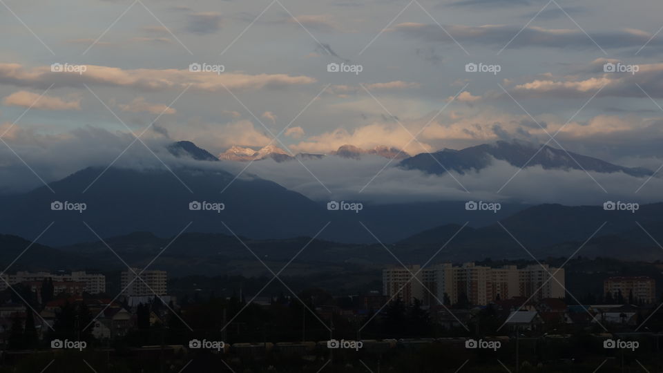 twilight over the city and mountains