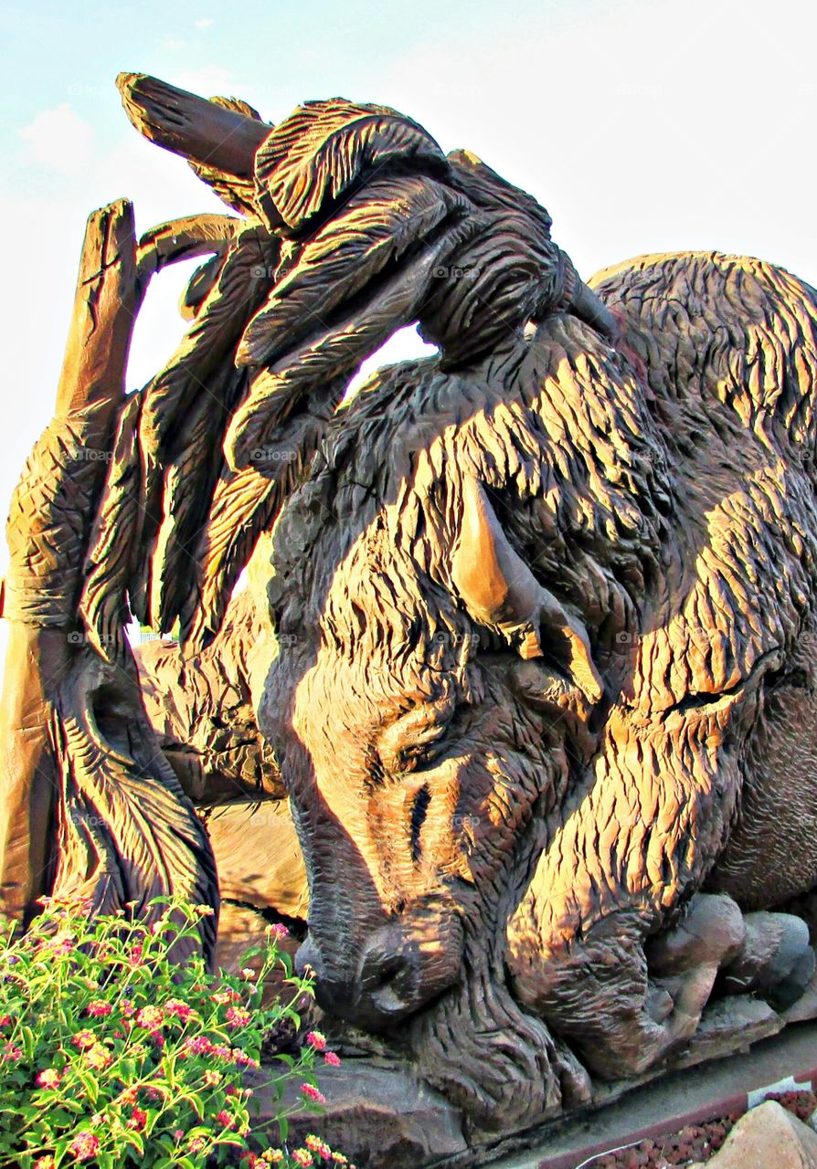 "broken Lance" . wooden sculpture. artistry. a wooden sculpture in front of a restaurant in northern California