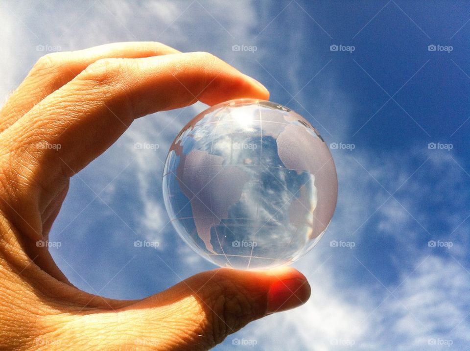 A person holding paper weight