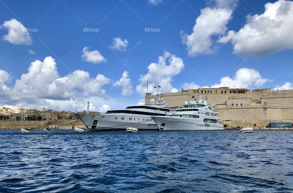 Luxury motor yachts in harbour 