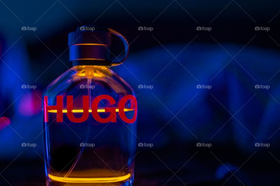 Hugo Man EAU De Toilette 125ML Dark blue ambient bedroom blurred background creative product photography