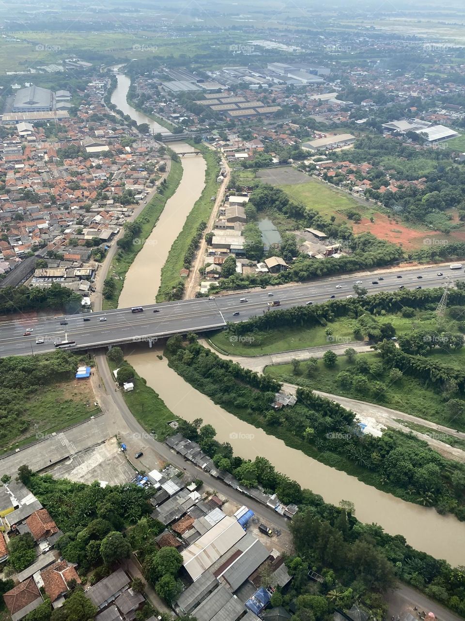 between the river and the highway
