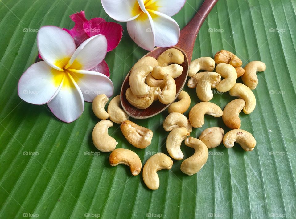 Mango pineapple on a spoon