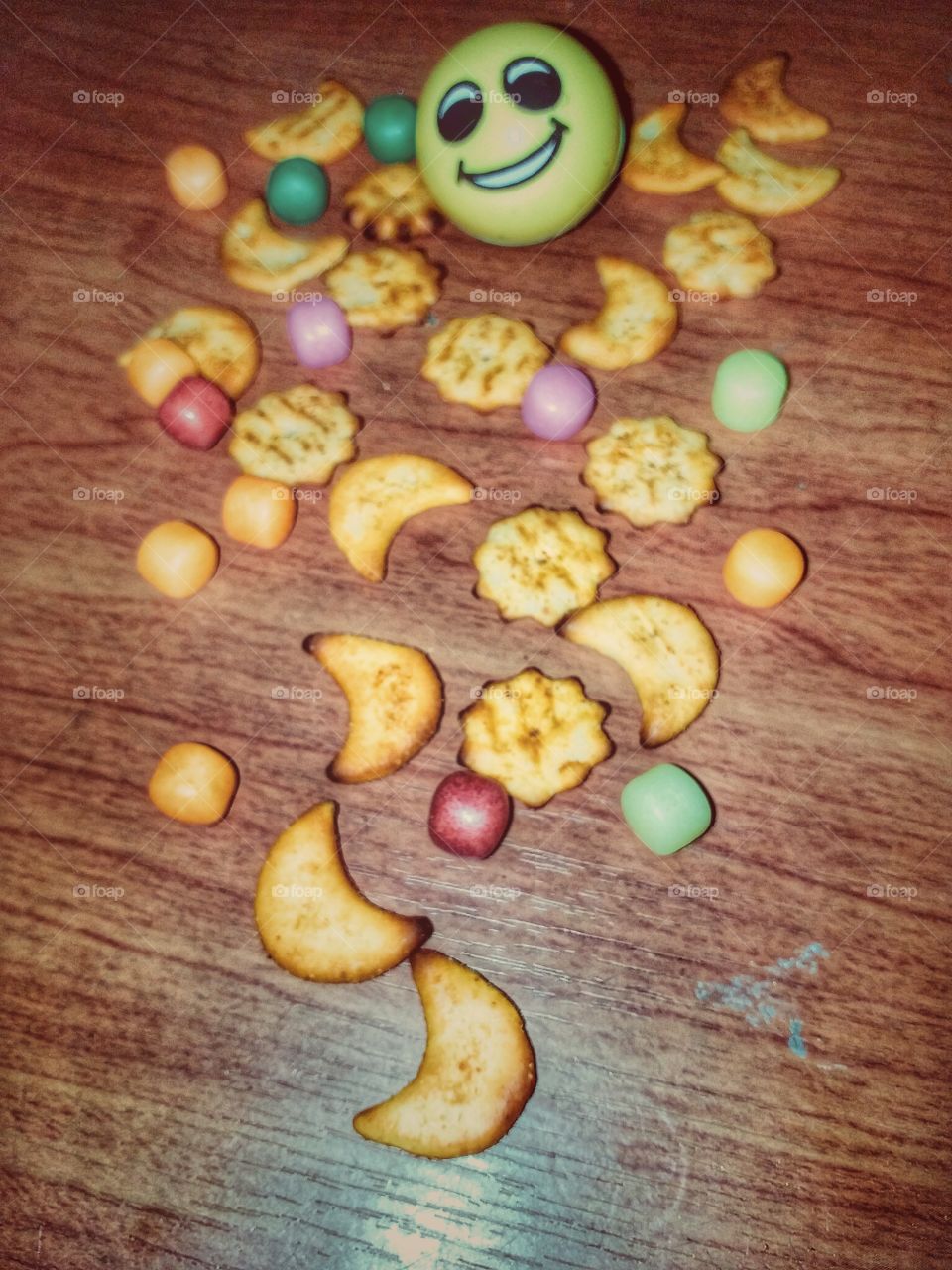 snacks with smile face in wooden table