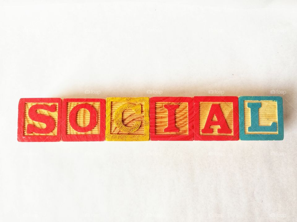 Written social with wooden cubes