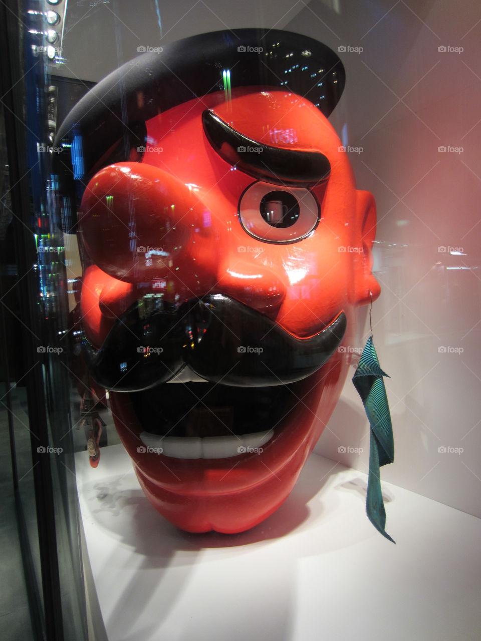 Glass Shop Display Window, Ginza, Tokyo, Japan.  Night time.  Giant Red Face, Head, Character with Moustache and Beret