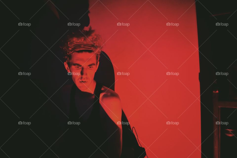 Portrait of a man standing at home